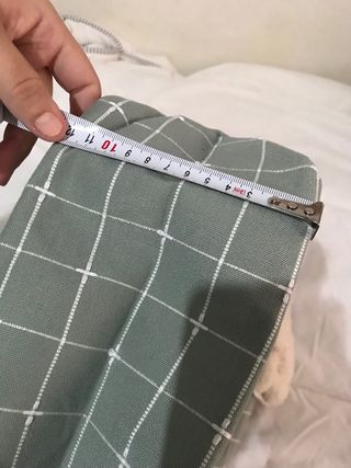 Mochila a cuadros gris sin estrenar