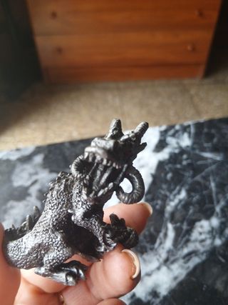 Figura dragón de plomo