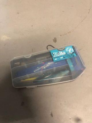 Caña de pescar con carrete