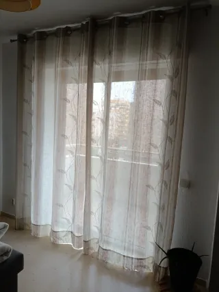 Tende in tessuto con asta