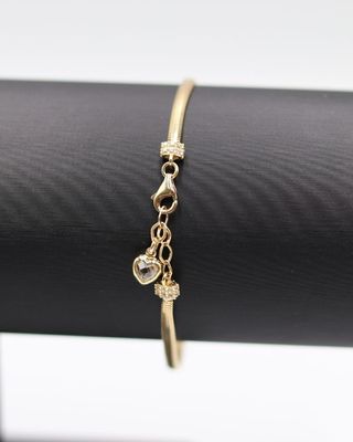 PULSERA SERPIENTE MARIPOSA CON CIRCONITAS. Oro18K.