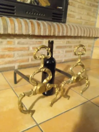 Antiguo juego de morillos para chimenea