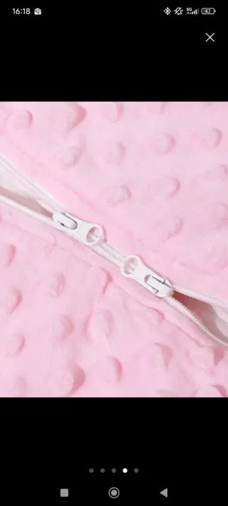 Saco de bebé rosa con cremallera