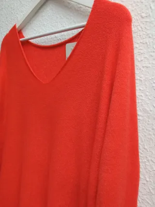 Jersey punto naranja cuello pico