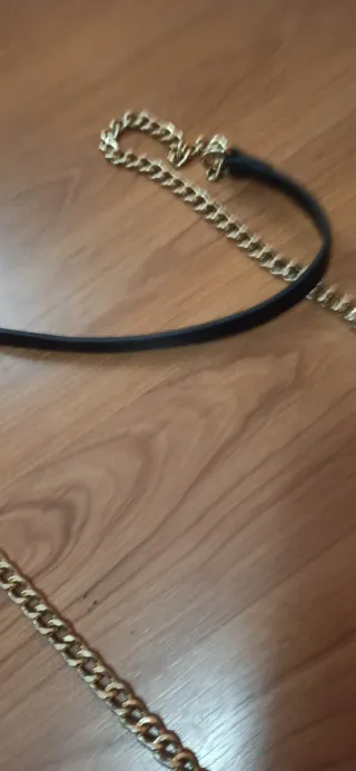 Bolso negro estampado serpiente