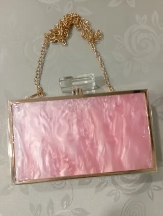 Bolso de fiesta rosa nácar cierre de metraquilato