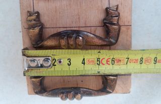 Tiradores de muebles.