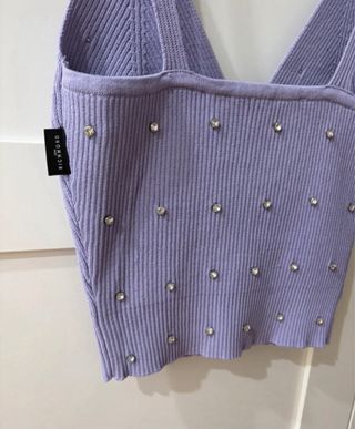 Top viola con brillantini