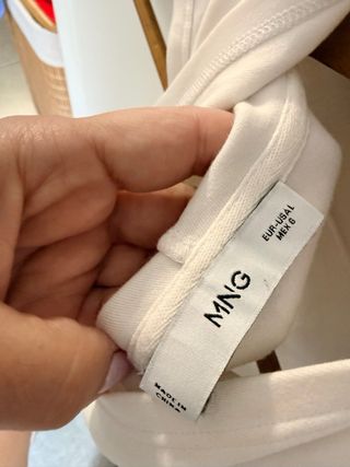 Camiseta sin mangas con cuello alto