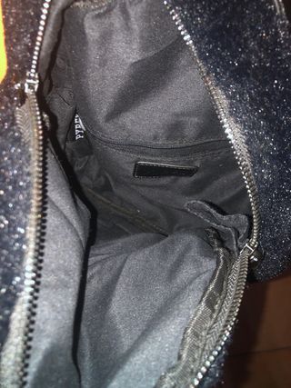 Zaino nero peloso con scritta pyrex brillantinata