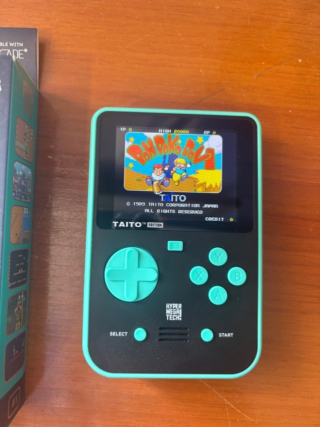 Taito Super Pocket + Cartucho Evercade Indie Heroe