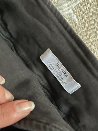 Minifalda vaquera negra con cinturón