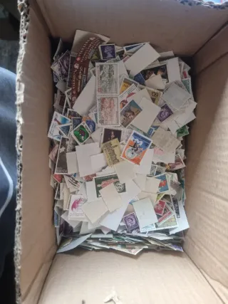 Clasificador de sellos + lote Filatélico