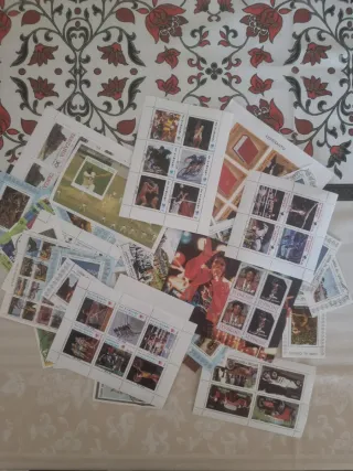 Clasificador de sellos + lote Filatélico