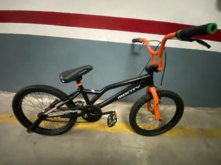 Bicicleta BMX Monty Negra y Naranja sin apena