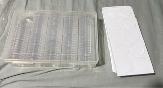 Caja y protectores para monedas