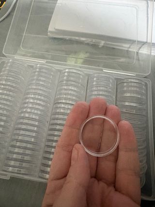 Caja y protectores para monedas