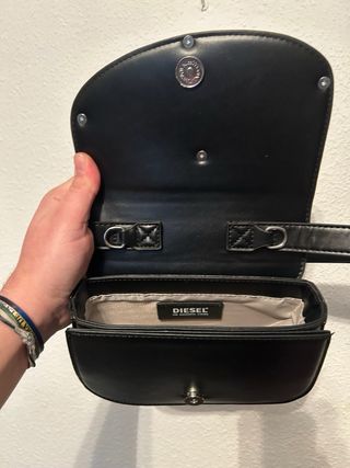 Borsa nera Diesel con logo ovale
