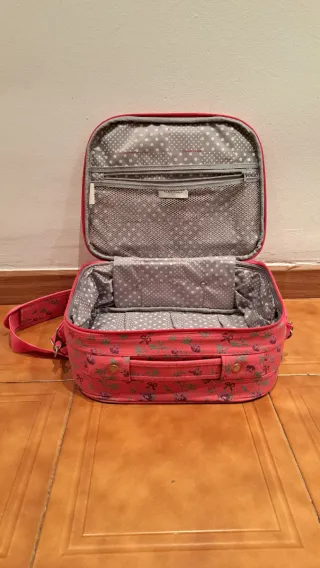 Maleta NAF NAF rosa con estampado floral