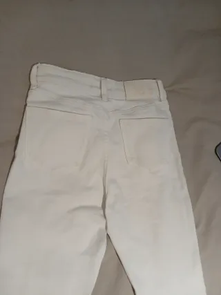 Pantalones Mango blancos acampanados