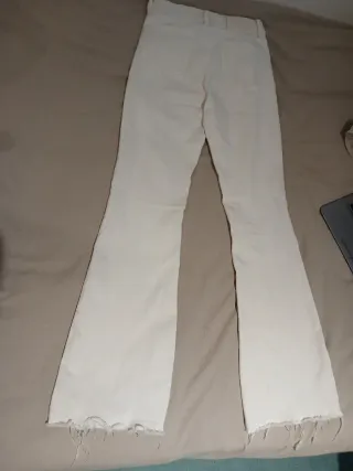 Pantalones Mango blancos acampanados