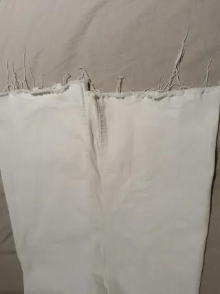 Pantalones Mango blancos acampanados