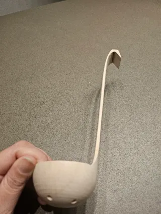 Cuchara de madera para escurrir