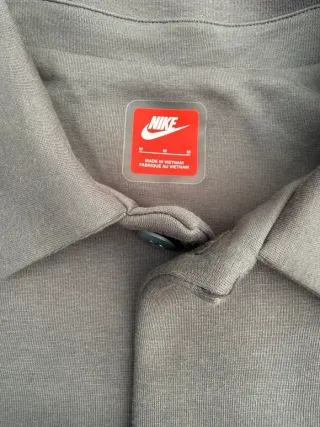 Giacchetta Nike grigia