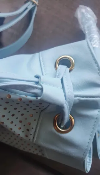 Bolso/Mochila Azul Perforado