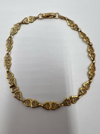 Pulsera de oro con diseño calado
