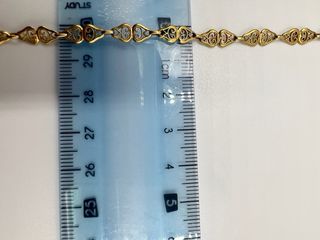 Pulsera de oro con diseño calado