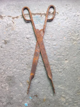 Tenazas de chimenea de metal