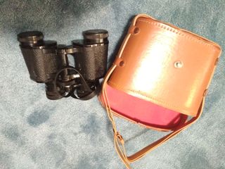 Prismáticos antiguos vintage con funda