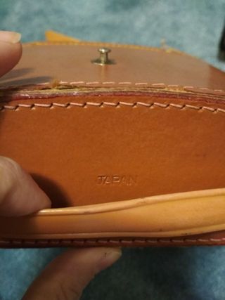 Prismáticos antiguos vintage con funda