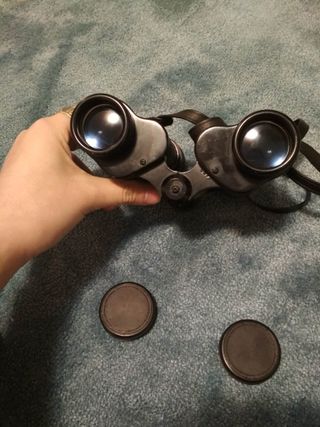 Prismáticos antiguos vintage con funda