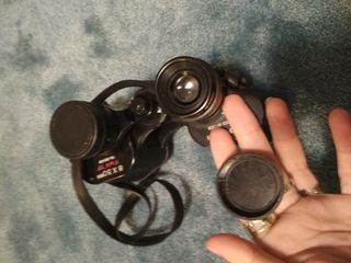 Prismáticos antiguos vintage con funda