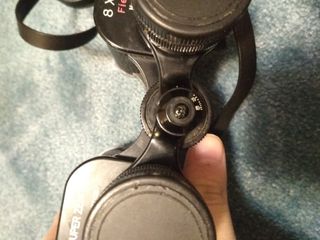 Prismáticos antiguos vintage con funda