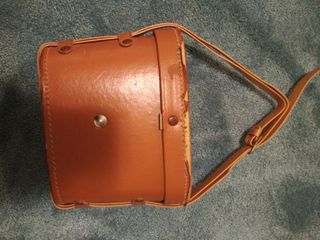 Prismáticos antiguos vintage con funda