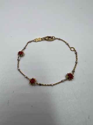 Pulsera de oro con mariquitas