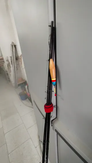 Caña  inglesa Okuma 3,90.. y carrete preston.