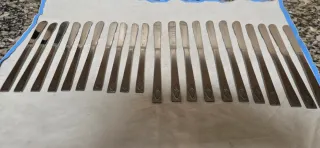 22 coltelli in metallo argentato