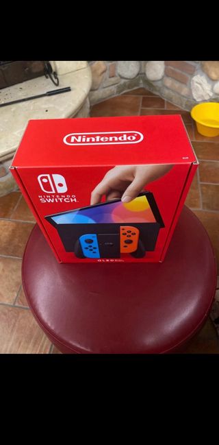 Nintendo Switch OLED Modello Blu/Arancio