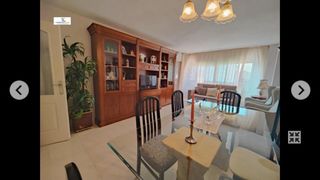 Silla comedor negra con tapizado geométrico