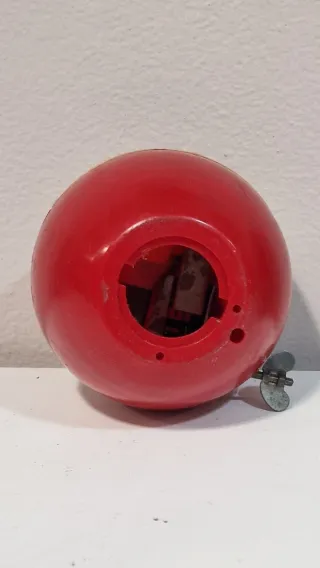 Salvadanaio a molla vintage Mela Wind Up