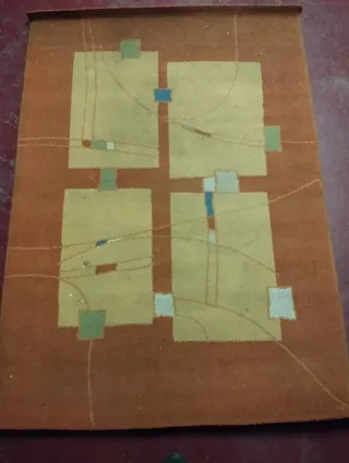 Alfombra naranja y amarilla