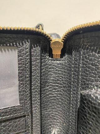 Cartera de viaje de piel de Gucci con asa