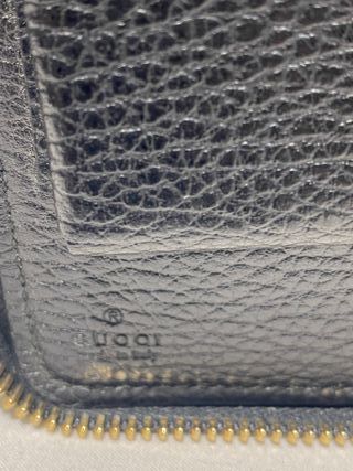 Cartera de viaje de piel de Gucci con asa