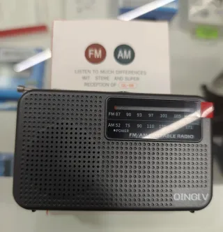 Linterna Kodak y Radio Portátil FM/AM