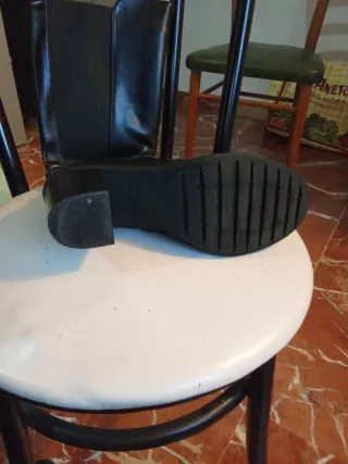 Botas altas negras con hebilla