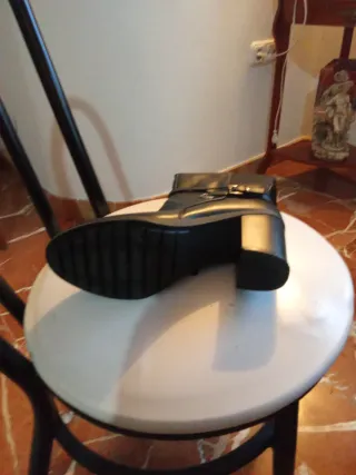 Botas altas negras con hebilla